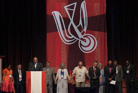 The Rev. Joe Daniels leads the Cabinet and Conference in prayer about the issue of gun violence.