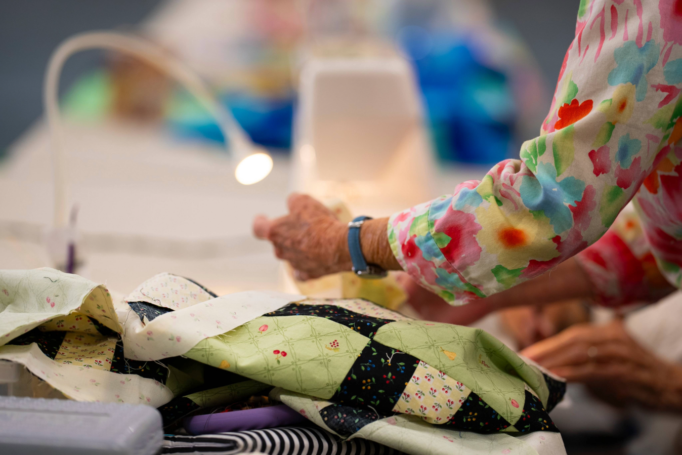 women making quilts