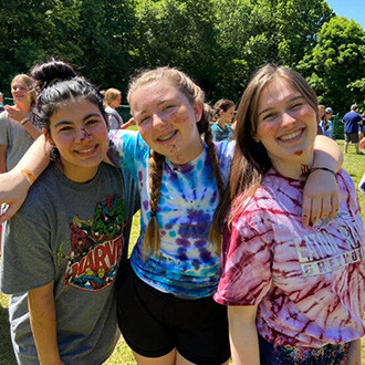 Student girls smiling at TVR Retreat