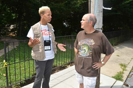 The Rev. Joan Carter-Rimbach, left, BWC’s Volunteer in Mission Coordinator, speaks Aug. 1 with the Rev. Sam Moore, pastor of Emory UMC in Ellicott City. Photo by Alison Burdett.