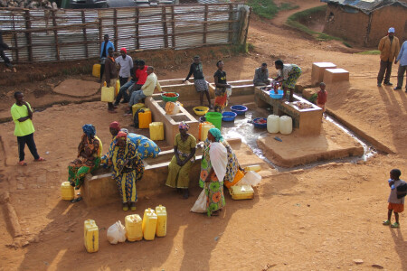 Congolese refugees at Gihembe Camp in Rwanda gather for wash day. 