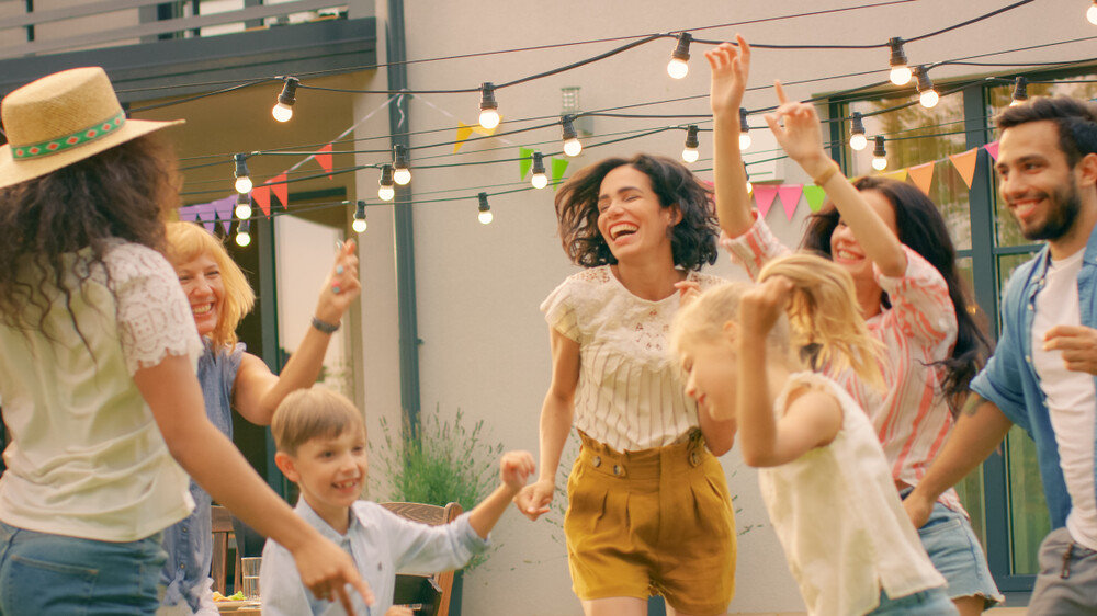 family-and-friends-dancing-together-at-a-summer-party