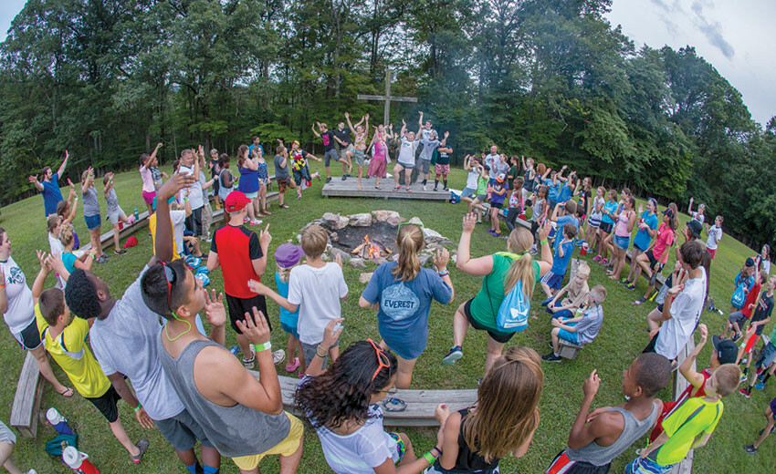 Campers and staff spend time in worship at Camp Manidokan, one of three retreat and camping facilities in the Baltimore-Washington Conference. Retreat and Camping Ministry continues to grow in the BWC (see story below).