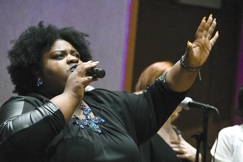 Candice Potts offers the song, “I Can Only Imagine,” during the recent Lead Like a Woman conference near Baltimore.