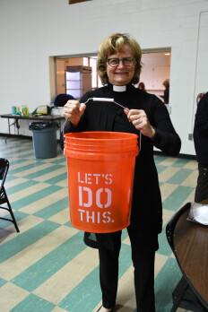 Mt. Olive UMC in Randallstown partnered with Home Depot and other retailers to create flood relief buckets, which they sent forth with a blessing.
