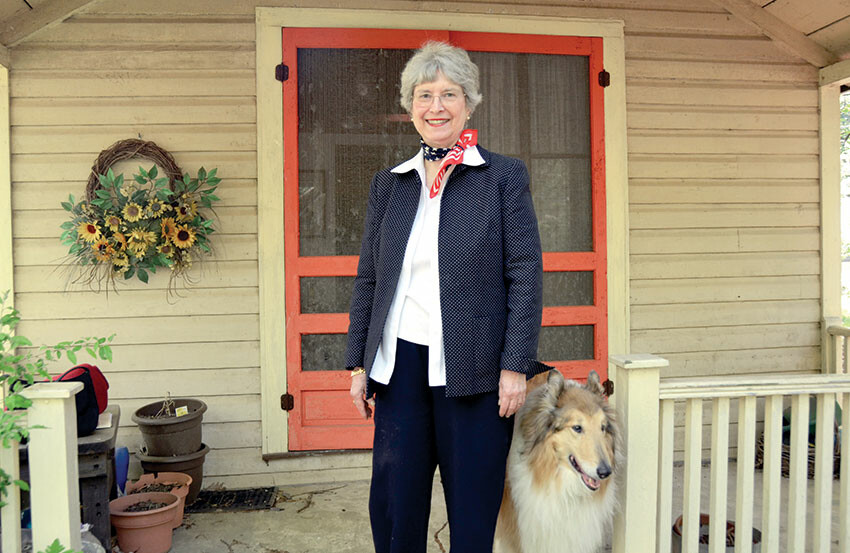 Ann Weller Dahl stands in front of her cottage at Emory Grove, along with a neighbor’s collie, Fred. Emory Grove celebrates 150 years in ministry in 2017.