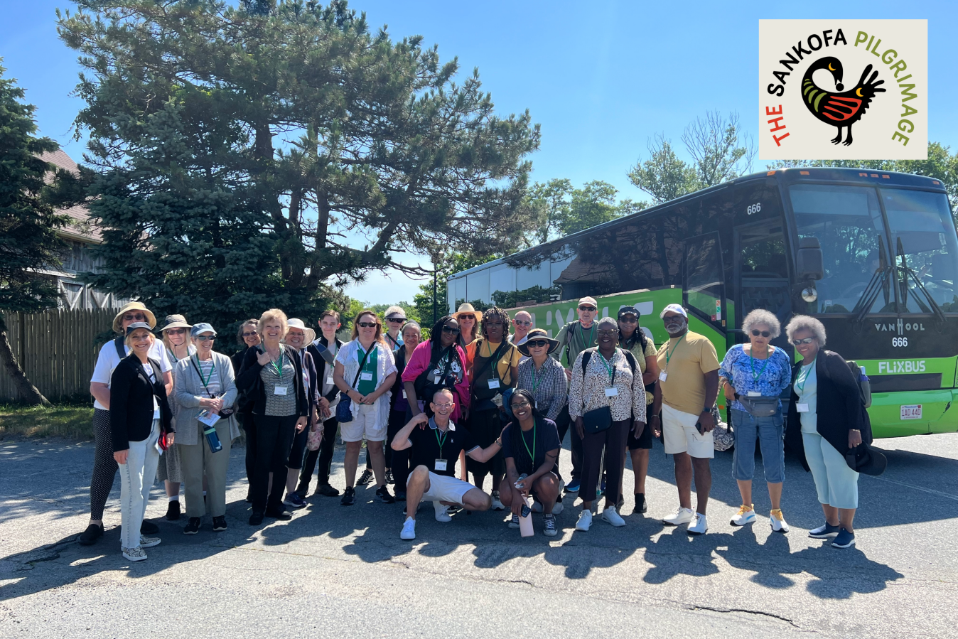 2024 sankofa pilgrim group in front of tour bus