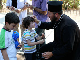FM-with-child-at-Capharnaum_small