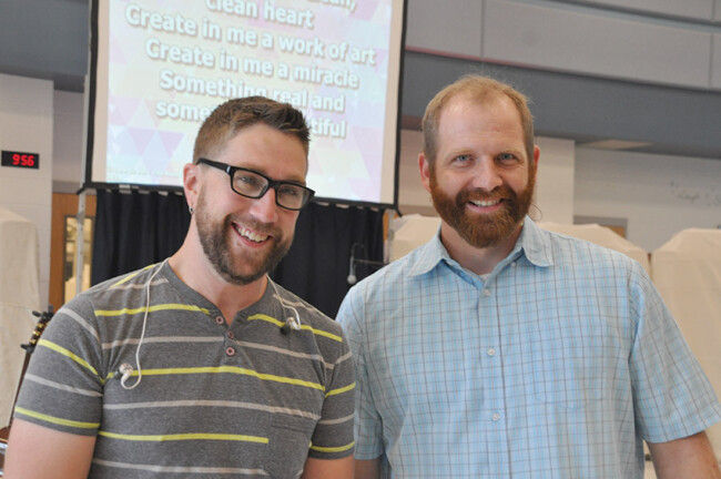 Ben Trawick, left, and the Rev. Chris Bishop prepare for worship at FaithPoint. They've created a ground-breaking online worship community.