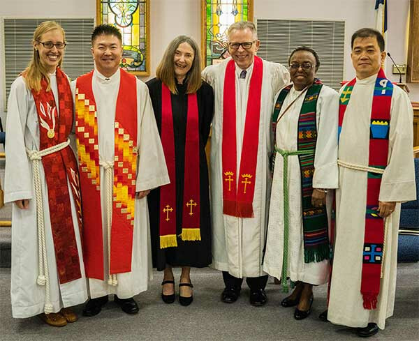 Pastor Bonnie Scott is joined by District Superintendent J.W. Park, former Trinity pastors, the Revs. Ann Yarbrough, Jim Miller, Mamie Williams, and the leader of Trinity’s Korean Ministry, the Rev. Keystone Lee. 
