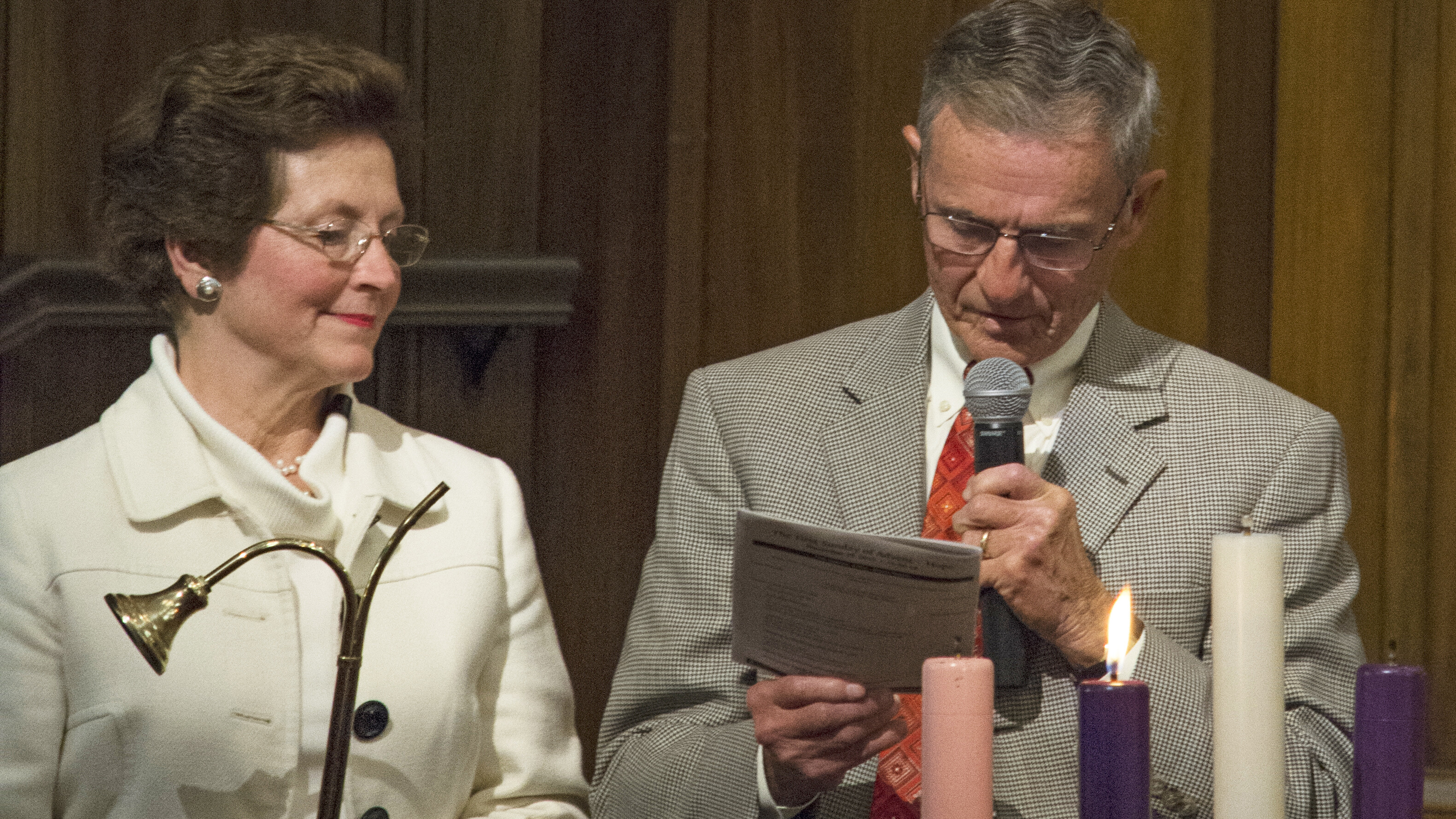 Bob and Sydnor lighting the Advent candle at First Baptist