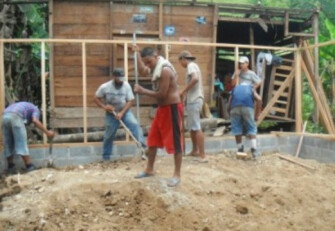 Helping Rebuild Dona Blanca's home