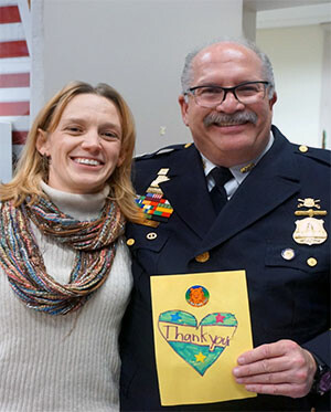 The Rev. Alisa Wailoo, left, pastor of Capitol Hill UMC, stands wtih Capt. Mark Beach.