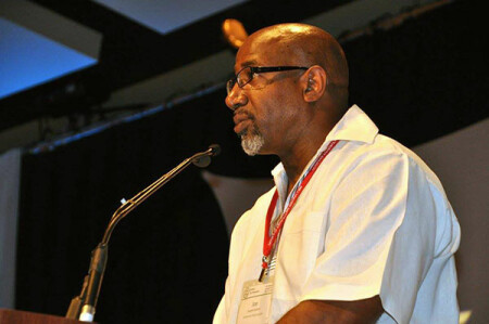 Rev. Joe Daniels presents the resolution at the Northeastern Jurisdiction Conference on Thursday, July 14.