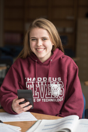 Student smiling at camera