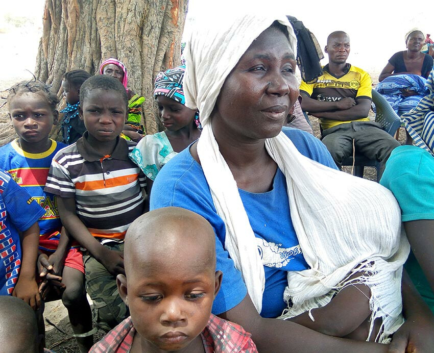 A woman holds a baby while seated among refugees at a United Methodist church in Jalingo, Nigeria. United Methodist churches in Nigeria served as refugee camps for people displaced after attacks on villages in Lau, a local government area in Taraba State, in early 2017. Photo by the Rev. Ande I. Emmanuel.