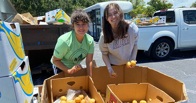 Students unloading food delivery