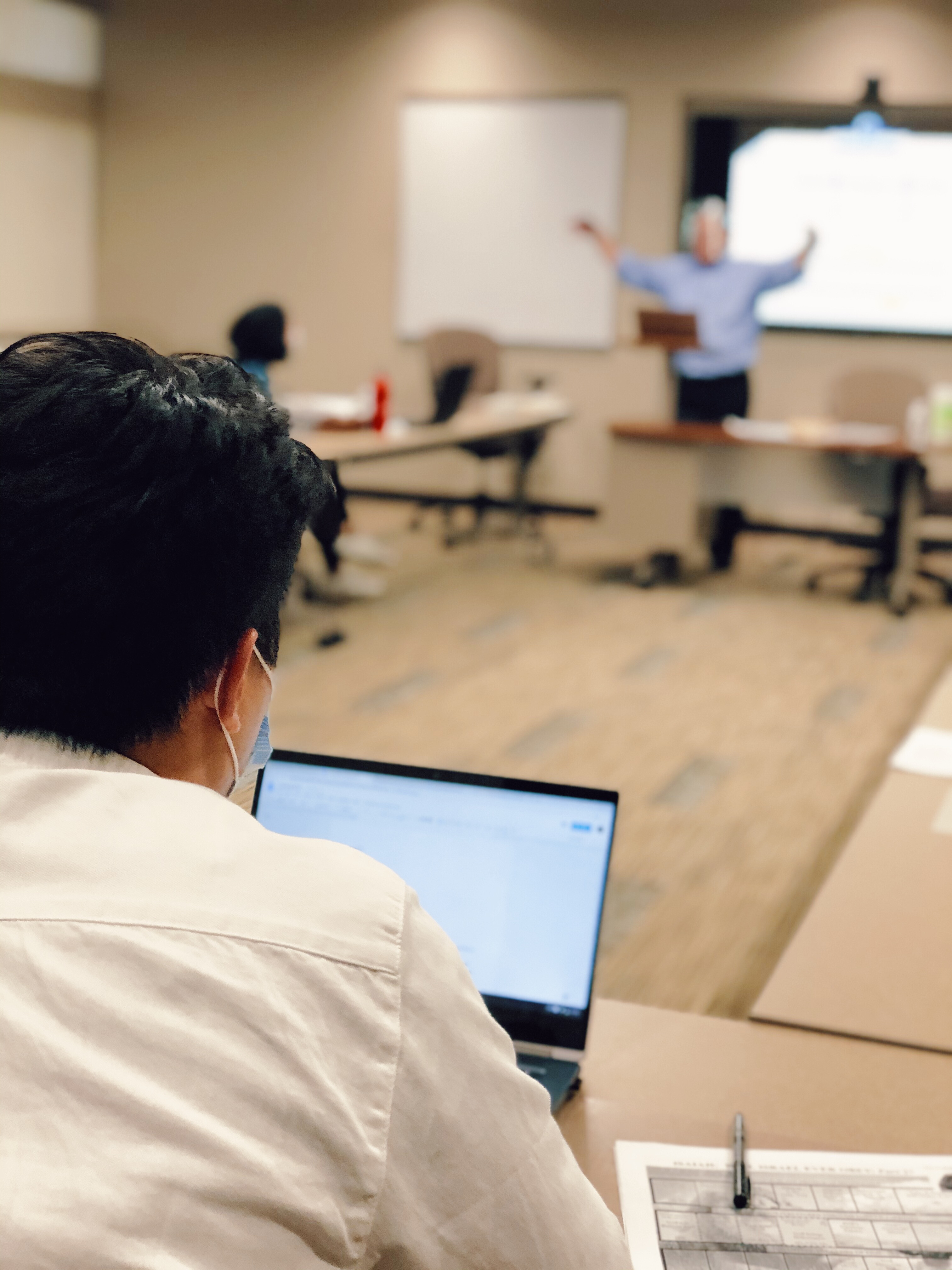 Student listening to professor