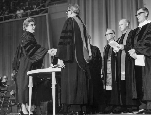 Lay adult members Emma Tousant of the Evangelical United Brethren and J.P. Zepeda of the Methodist Church shake hands as part of the uniting ceremony that marked the formation of The United Methodist Church in 1968. This moment of celebration was years in the making.