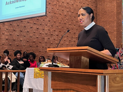 The Rev. Stacy Cole Wilson speaks at the United to Love Prayer service.&nbsp;