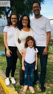 Pastor Rubén Contreras and his wife Karina Briceño and their two daughters
