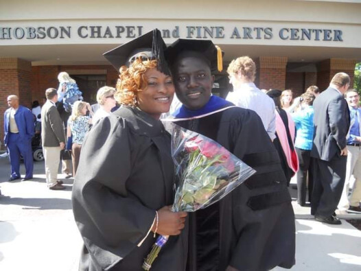 Euphemia and Pascal Binda pose for a picture at Euphemia's SWU graduation ceremony