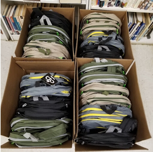 BP 2019 Boxes and boxes of backpacks were stuffed 152 backpacks in all