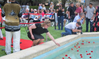 Genevieve Turner Razim placing of flowers in the Reflection Pool