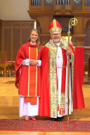 Bishop Miller congratulates Dorota Pruski on her ordination